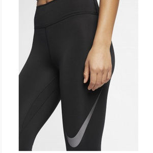 nike swoosh tight